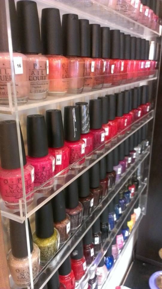 Wall of nail polish colours at the salon
